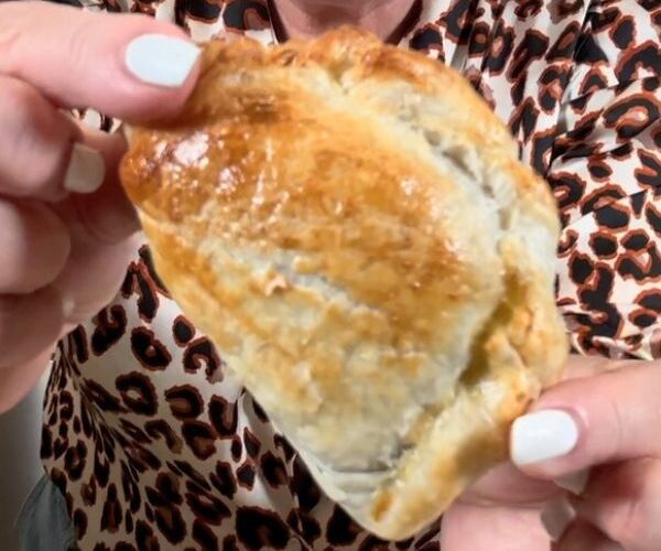4 Ingredient Spinach Triangle Pies holding
