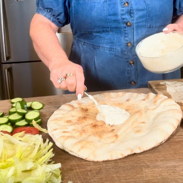 Chicken Shawarma making the wraps