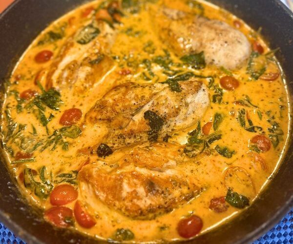 Creamy Tuscan Chicken cooked in pot