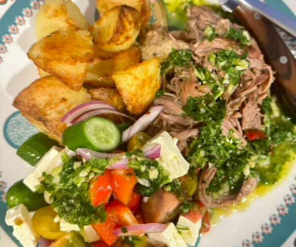 Roast Lamb with Chimichurri Sauce served on plate