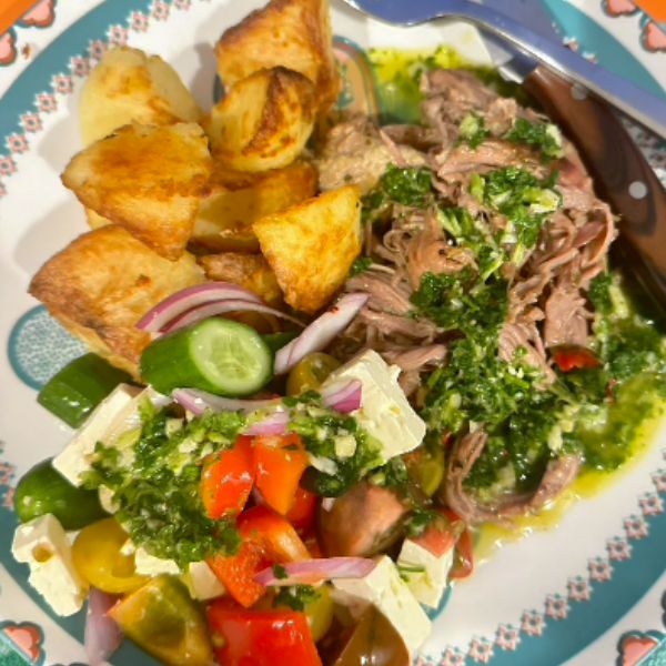 Roast Lamb with Chimichurri Sauce served on plate