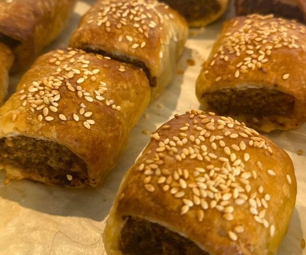 Sausage Rolls cooked on tray