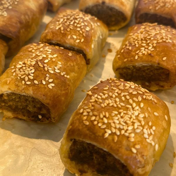 Sausage Rolls cooked on tray