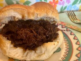 Slow Cooked Pulled Beef plated on plate