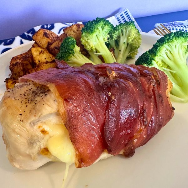 Air Fryer Prosciutto Wrapped Chicken served on plate