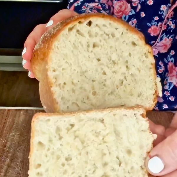 Homemade Bread sliced Homemade Bread sliced and holding