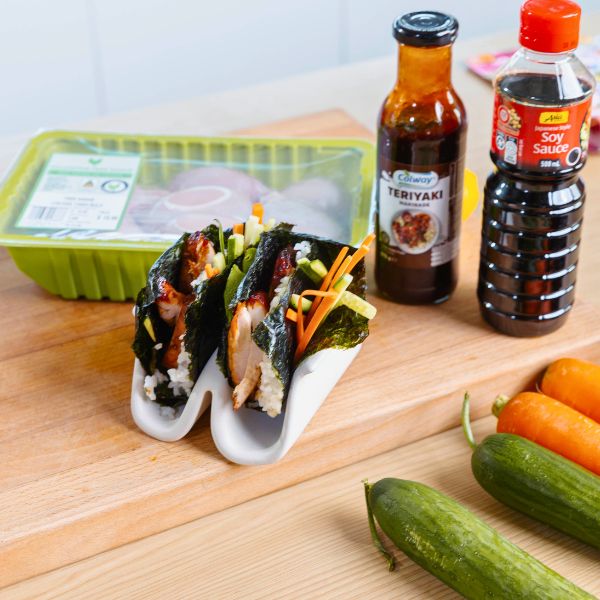 Sushi Sandwich with Teriyaki Chicken ingredients Sushi Sandwich with Teriyaki Chicken ingredients layed on table