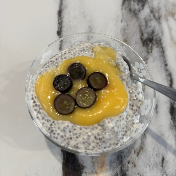Easy microwave lemon curd over a chia seed pudding in a glass bowl