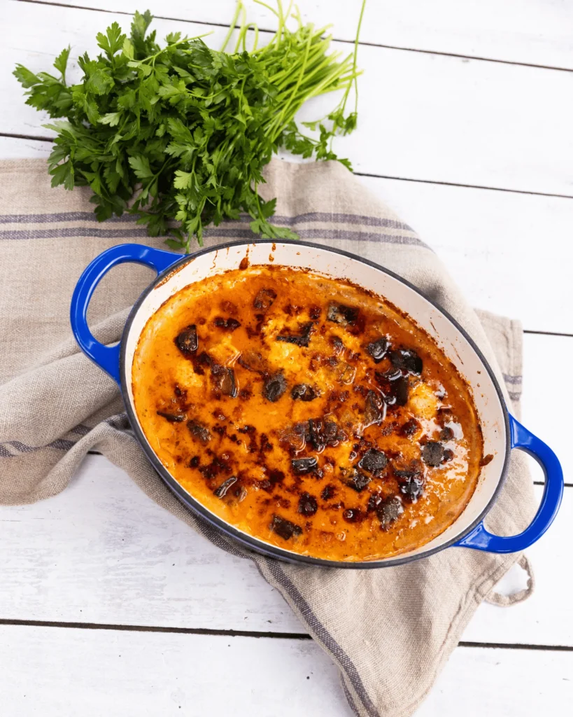 Cheats moussaka baked with lamb mince, potato, eggplant and cheesy bechamel sauce